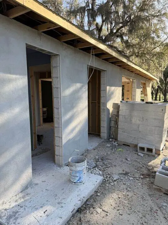 Stucco exterior on a new block home