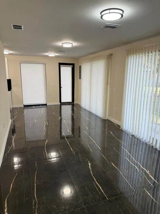 Polished large format tile in a living room