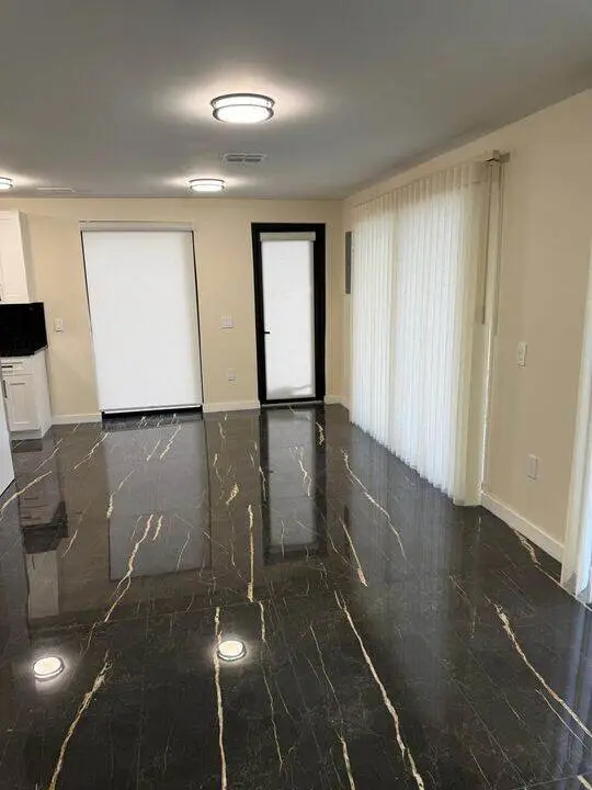 Finished living area with tile floor