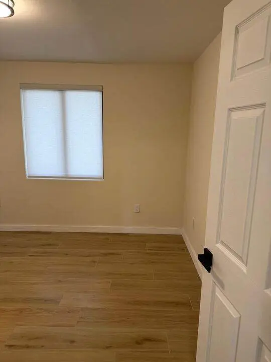 Wood look floor in a finished bedroom