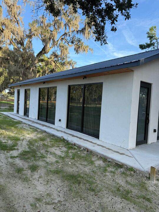 New home exterior with metal roof in Ocala FL
