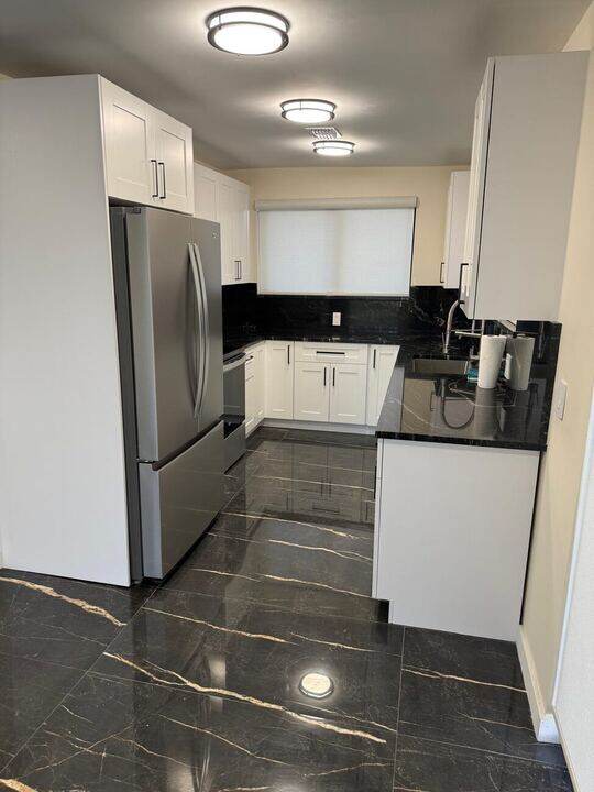 Kitchen with stainless steel appliances