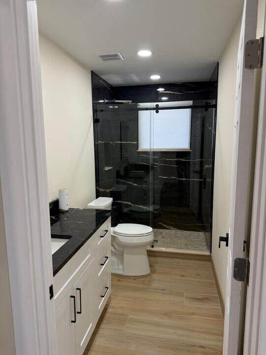 Bathroom with glass shower enclosure