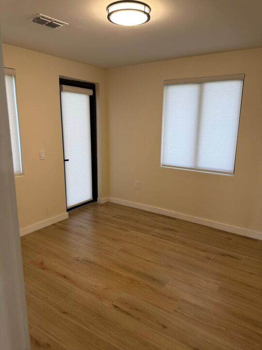 Bedroom with window blinds